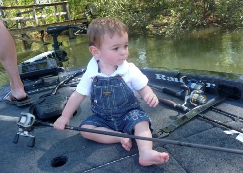 I like the weight of this one, Dad.  Now, is it OK if I drive the boat?